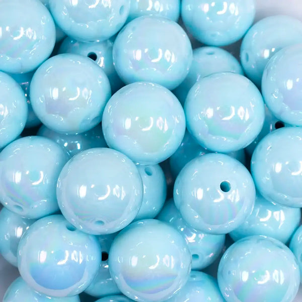 close up view of a pile of 20MM Pastel Blue AB Solid Chunky Bubblegum Beads