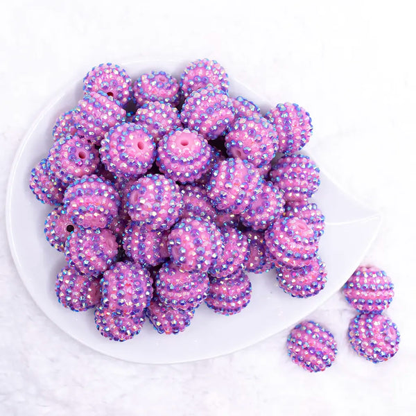 top view of a pile of 20mm Pink and Purple Striped Rhinestone AB Bubblegum Beads
