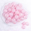 top view of a pile of 20mm Light Pink Crackle AB Bubblegum Beads