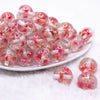 front view of a pile of 20mm Pink Flaked Flower Bubblegum Bead