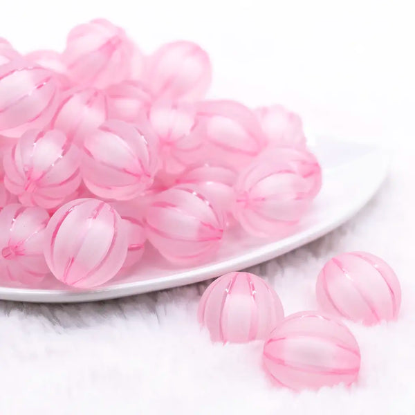 front view of a pile of 20mm Pink Frosted Pumpkin Shaped Bubblegum Bead