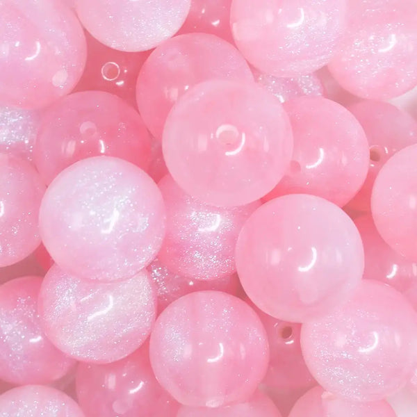 close up view of a pile of 20mm Pink Glitter Pearl Bubblegum Bead