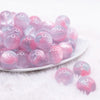 front view of a pile of 20mm Pink Illusion Glitter Bubblegum Bead