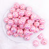 top view of a pile of 20mm Pink Paw Print Animal AB Print Bubblegum Beads