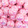 close up view of a pile of 20mm Pink Paw Print Animal AB Print Bubblegum Beads