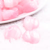 close up view of a pile of 20mm Pink Opal Heart Shaped Acrylic Beads