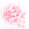 top view of a pile of 20mm Pink Opal Heart Shaped Acrylic Beads