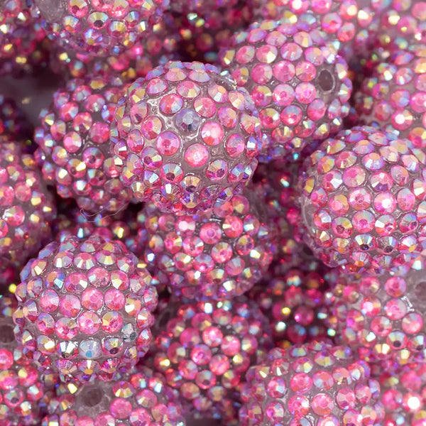 close up view of a pile of 20mm Pink Shimmer Rhinestone AB Bubblegum Beads