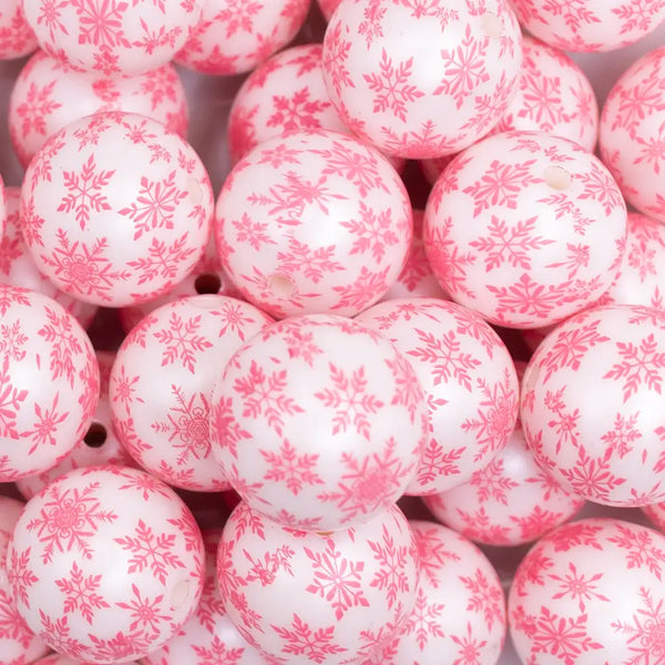 close up view of a pile of 20mm Pink Snowflake Print on White Acrylic Bubblegum Beads