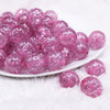 front view of a pile of 20mm Pink Glitter Tinsel Bubblegum Beads