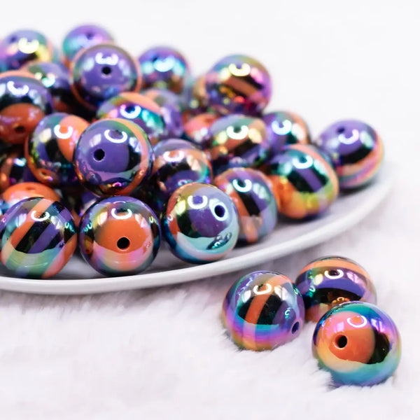 front view of a pile of 20mm Orange and Purple Stripes AB Bubblegum Beads