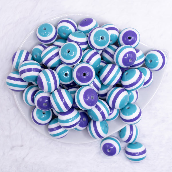 top view of a pile of 20mm Teal and Purple Stripes Bubblegum Jewelry Beads