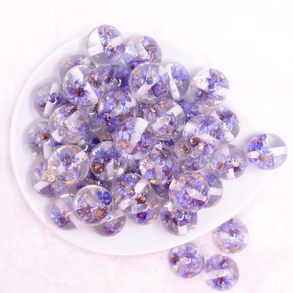 close up view of a pile of  20mm Purple Flaked Flower Bubblegum Bead