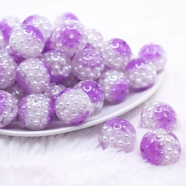 front view of a pile of 20mm Purple Captured Pearls Bubblegum Bead