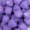 close up view of a pile of 20mm Purple Cube Faceted Bubblegum Beads