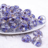 front view of a pile of  20mm Purple Flaked Flower Bubblegum Bead