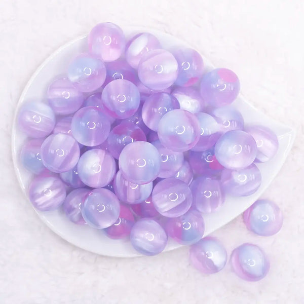 top view of a pile of 20mm Purple Illusion Glitter Bubblegum Bead