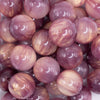close up view of a pile of 20mm Purple Luster Bubblegum Beads
