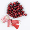 top view of a pile of DIY 16mm Red & Black Plaid Wood Garland Starter Kit - Over 50 pieces