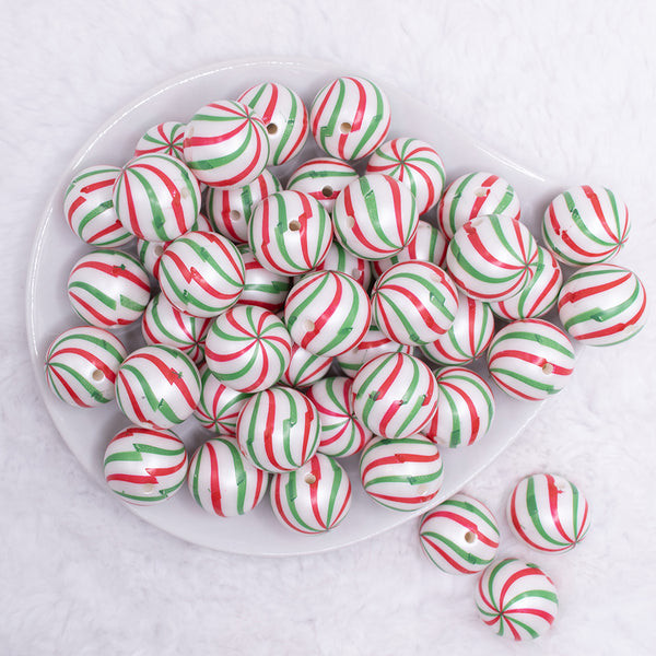 top view of a pile of 20mm Red and Green Peppermint Candy Print Bubblegum Beads