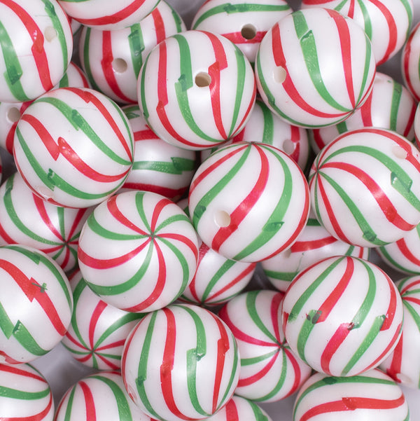 close up view of a pile of 20mm Red and Green Peppermint Candy Print Bubblegum Beads