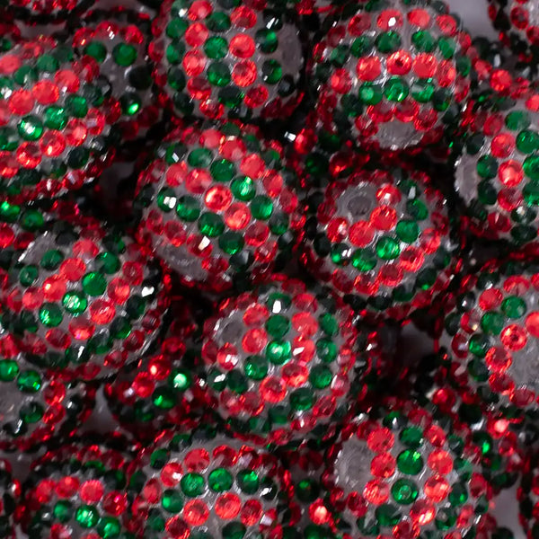 Close up view of a  pile of 20mm Red and Green Striped Rhinestone Bubblegum Beads
