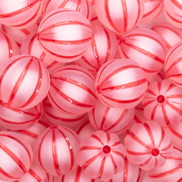 close up view of a pile of 20mm Red Frosted Pumpkin Shaped Bubblegum Bead