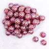 top view of a pile of 20mm Red Lace AB Bubblegum Beads
