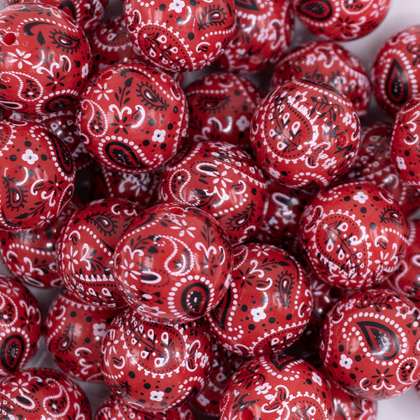 close up view of a pile of 20mm Red Paisley Acrylic Bubblegum Beads