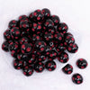 top view of a pile of 20mm Red Polka Dots on Black Acrylic Bubblegum Beads