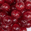 close up view of a pile of 20mm Red Glitter Tinsel Bubblegum Beads