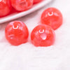 macro view of a pile of 20mm Red Heart Glitter Shimmer Bubblegum Bead