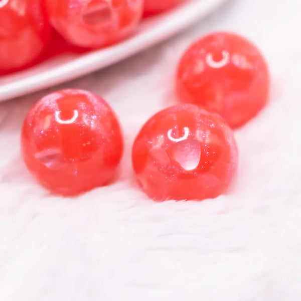 macro view of a pile of 20mm Red Heart Glitter Shimmer Bubblegum Bead