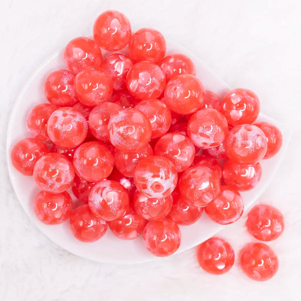 top view of a pile of 20mm Red Heart Glitter Shimmer Bubblegum Bead