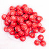 top view of a pile of 20mm Red with White Snowflake Print Bubblegum Beads