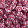 close up view of a pile of 20mm Pink, Red & Silver Striped Rhinestone AB Bubblegum Beads