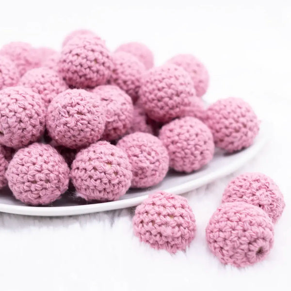 front view of a pile of 20mm Rose Pink Crochet wooden bead