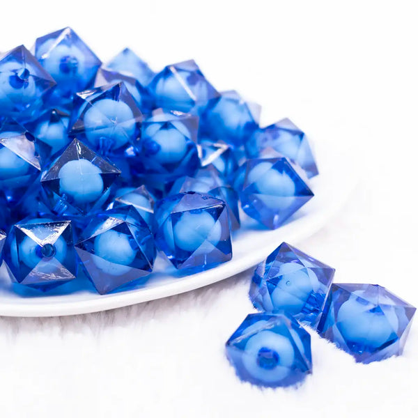 front view of a pile of 20mm Royal Blue Transparent Cube with Middle Bubblegum Beads