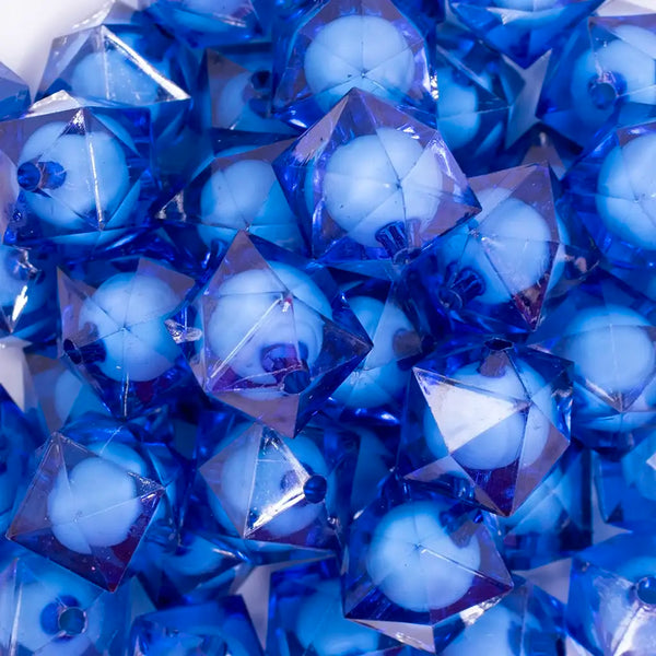 close up view of a pile of 20mm Royal Blue Transparent Cube with Middle Bubblegum Beads