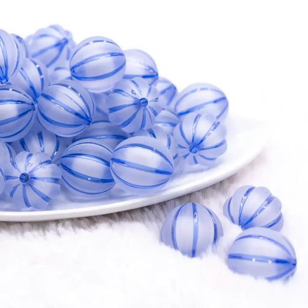 front view of a pile of 20mm Royal Blue Frosted Pumpkin Shaped Bubblegum Bead