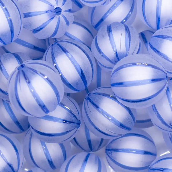 close up view of a pile of 20mm Royal Blue Frosted Pumpkin Shaped Bubblegum Bead