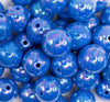 close up view of a pile of 20mm Royal Blue Solid AB Bubblegum Beads