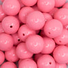 close up view of a pile of 20mm Salmon Pink Solid Bubblegum Beads
