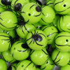 close up view of a pile of 20mm Spider Print on Green  Bubblegum Beads