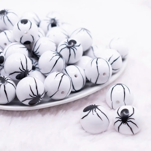 front view of a pile of 20mm Spider Print on White Bubblegum Beads