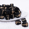 front view of a pile of 20mm Black Square luxury bead with gold Bee and Love Accents