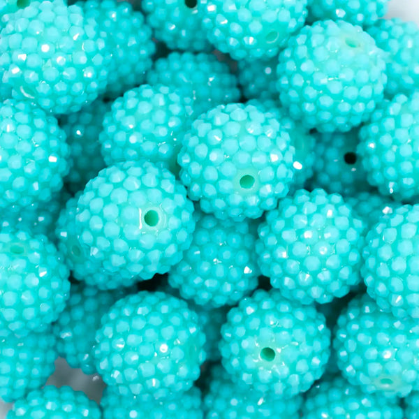 close up view of a pile of 20mm Teal on Teal Rhinestone Bubblegum Beads