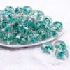 front  view of a pile of 20mm Teal Blue Flaked Flower Bubblegum Bead