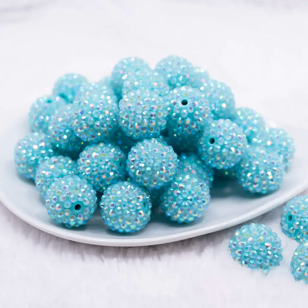 front view of a pile of 20mm Turquoise Rhinestone AB Bubblegum Beads