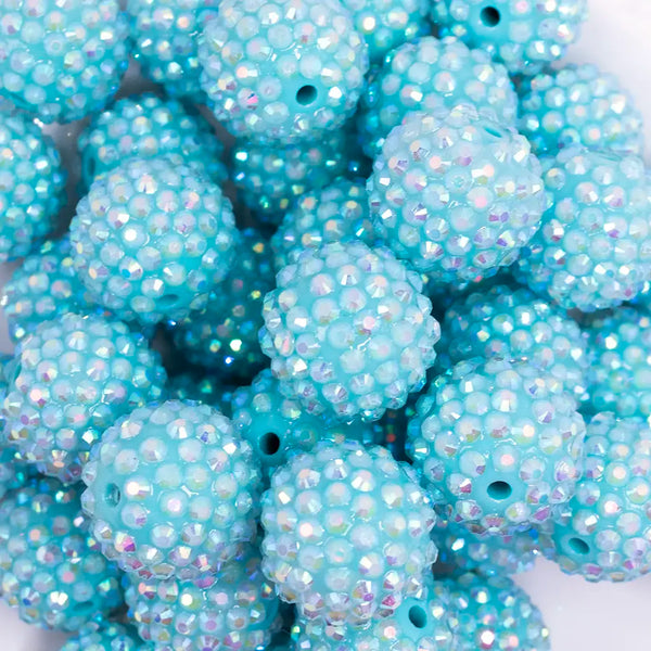 close up view of a pile of 20mm Turquoise Rhinestone AB Bubblegum Beads
